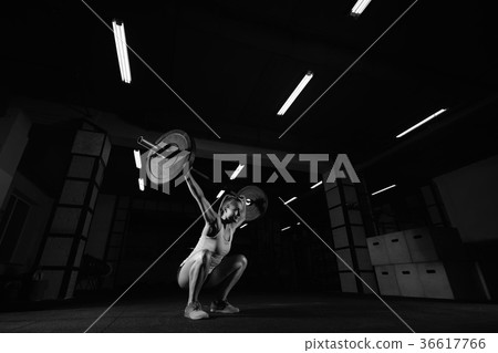 Female fitness athlete exercising Female fitness athlete exercising 36617766
