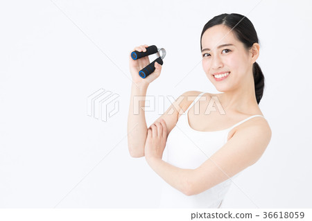 Woman doing muscle training white back image 36618059