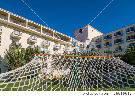 View of the Hotel Nikko Alivila from a Hammock View of the Hotel Nikko Alivila from a Hammock 36619612