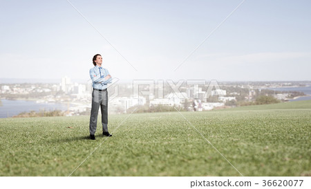 Confident businessman outdoors 36620077