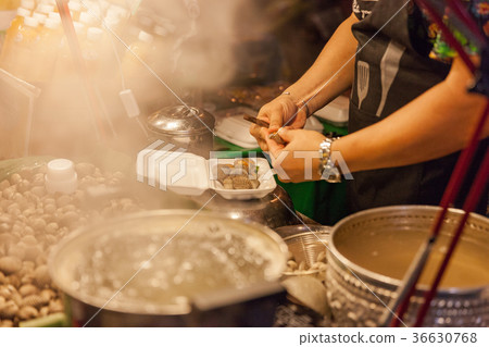 Man prepare clams for sale Man prepare clams for sale 36630768
