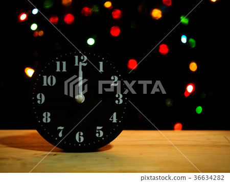 Light bokeh with a black background. Light bokeh with a black background. 36634282