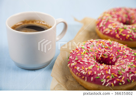 Donuts and a cup of coffee Donuts and a cup of coffee 36635802