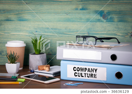 Company Culture. Binders on desk in the office. Business background 36636129