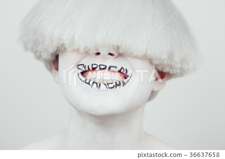 A girl with white skin and a white wig with an A girl with white skin and a white wig with an 36637658