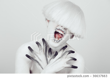 A girl with white skin and a white wig with an A girl with white skin and a white wig with an 36637663
