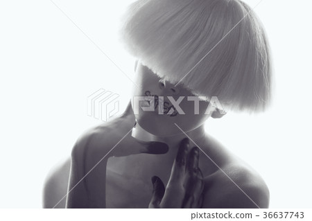 A girl with white skin and a white wig with an A girl with white skin and a white wig with an 36637743