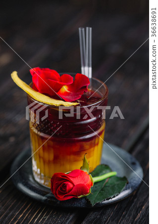 Two-layered cocktail with rose  36638691