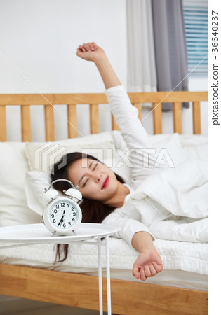 Woman, weather, alarm, sleep, oversleep, bed 36640237