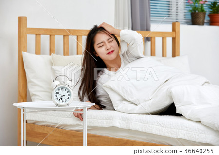 Woman, weather, alarm, sleep, oversleep, bed 36640255