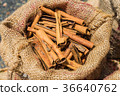 Bag of Cinnamon sticks background at market 36640762