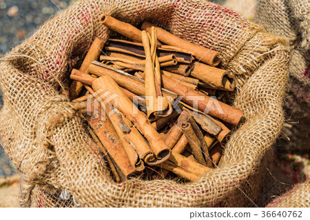 Bag of Cinnamon sticks background at market Bag of Cinnamon sticks background at market 36640762