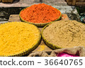 Turmeric powder on the trays in the market 36640765