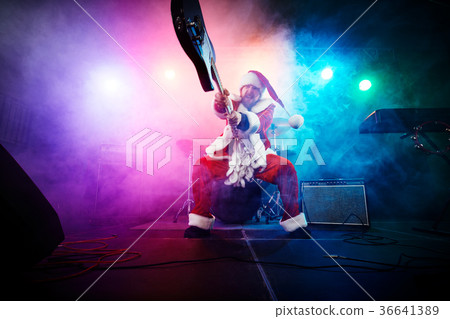 Santa Claus plays rock. Santa Claus plays rock. 36641389