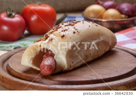 Sausage baked in dough. Sausage baked in dough. 36642830