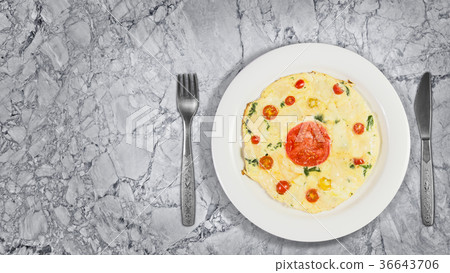 Omelette with spinach and cheese and tomatoes Omelette with spinach and cheese and tomatoes 36643706
