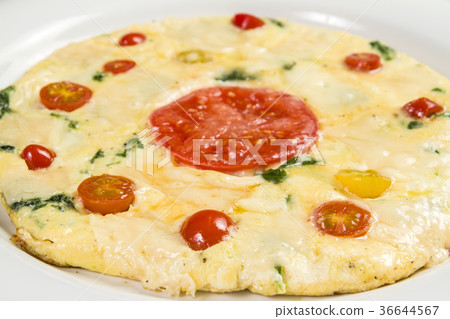 Omelette with spinach and cheese and tomatoes Omelette with spinach and cheese and tomatoes 36644567