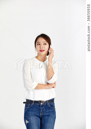 Twenties woman enjoying cell phone Twenties woman enjoying cell phone 36650938