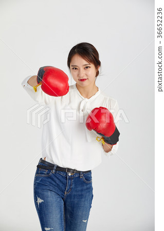 20 year old woman in boxing gloves 36652236