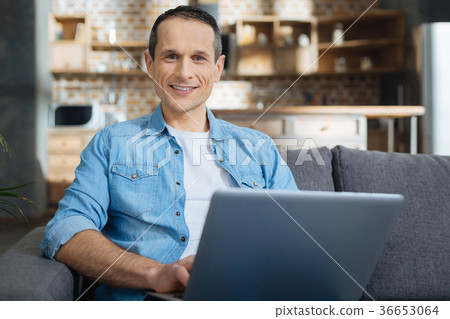 Handsome young man having distance work 36653064