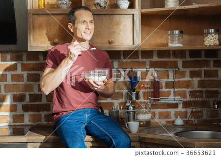 Positive delighted male person having idea 36653621