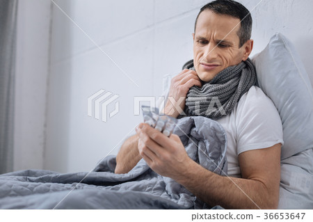 Emotional ill man going to take tablets Emotional ill man going to take tablets 36653647