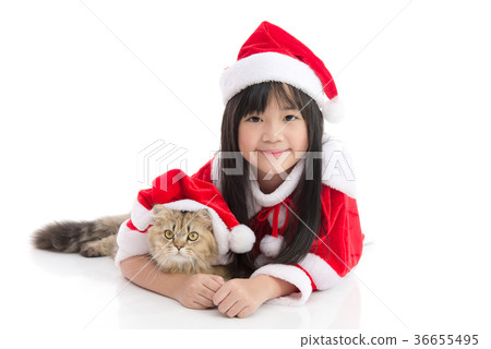 Asian girl and persian cat in santa claus uniform 36655495