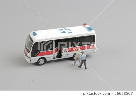 mini figure of policeman with hand cuffs 36658567