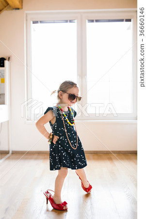little girl play heels