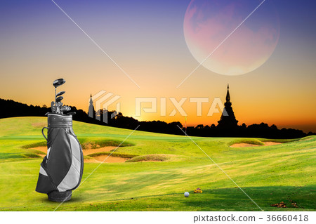 golf equipment on green and hole as background 36660418