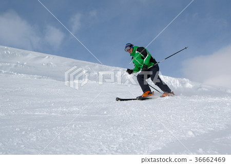 Skier on the slope 36662469