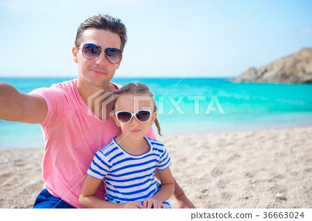 Young father and little kid taking selfie photo on Young father and little kid taking selfie photo on 36663024