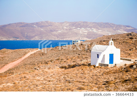 Traditional white church with sea view in Mykonos 36664433