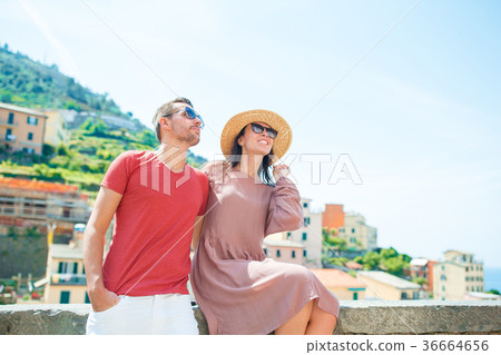 Happy couple with great view at old village Happy couple with great view at old village 36664656