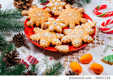 Christmas gingerbread cookies homemade on red  36665199