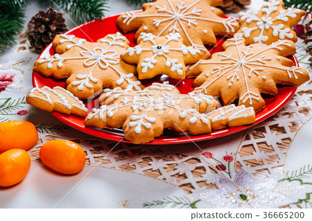 Christmas gingerbread cookies homemade on red  36665200