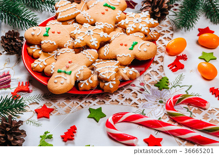 Christmas gingerbread cookies homemade on red 36665201