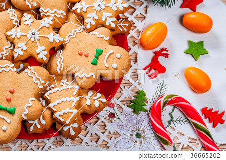 Christmas gingerbread cookies homemade on red  36665202