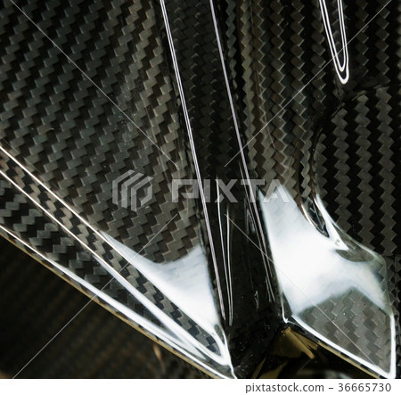 Carbon fiber composite raw material background 36665730