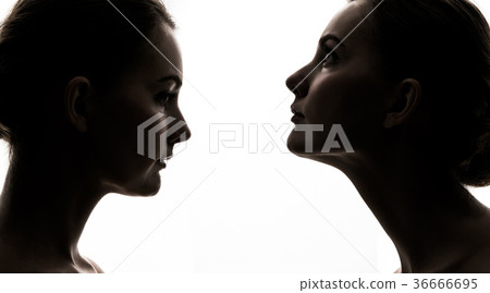 Opposite women silhouettes 36666695