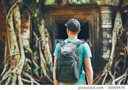 Traveler in the ancient temple 36669476