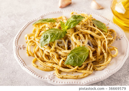 Pasta with homemade pesto sauce. 36669579