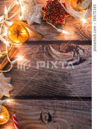 Christmas frame with lights, ornaments, candy and 36670165