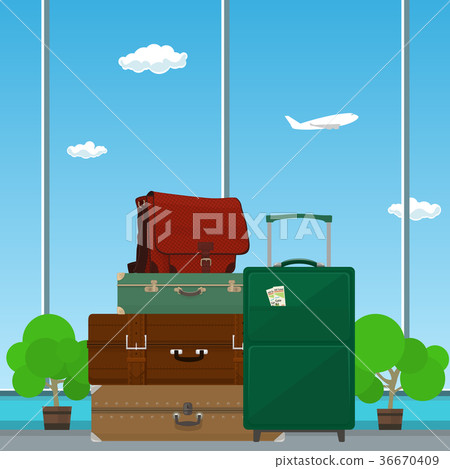 Suitcases and Bag against the Window 36670409