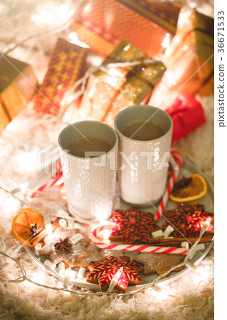 Hot chocolate drink with biscuits under the 36671533