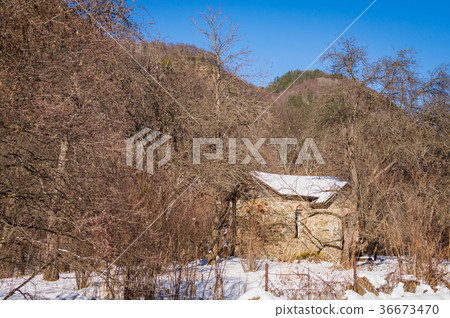 Old village house during winter period 36673470