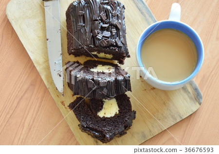dark chocolate cake roll filled cream with coffee dark chocolate cake roll filled cream with coffee 36676593