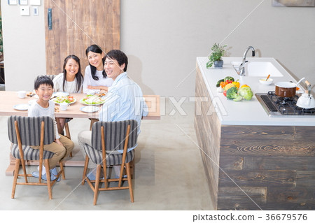 Family of 4 having a meal Father Father Mother Mother Sister Sister brother Family of 4 having a meal Father Father Mother Mother Sister Sister brother 36679576