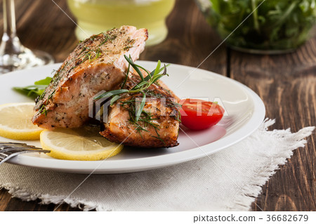 Fried salmon steak with vegetables Fried salmon steak with vegetables 36682679