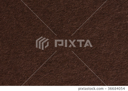 Dark brown paper texture abstract background. Dark brown paper texture abstract background. 36684054